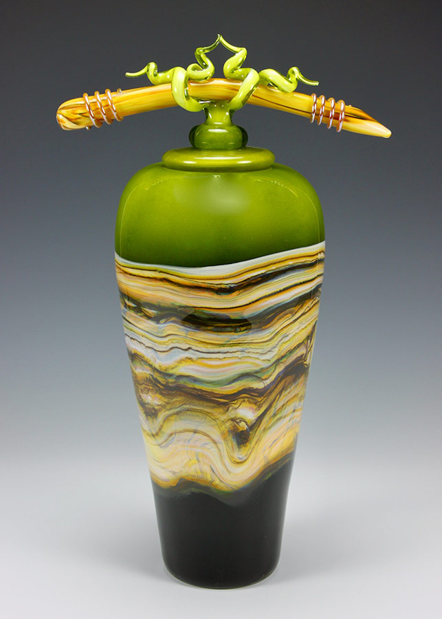 Lime glass covered vase with sculpted glass finial